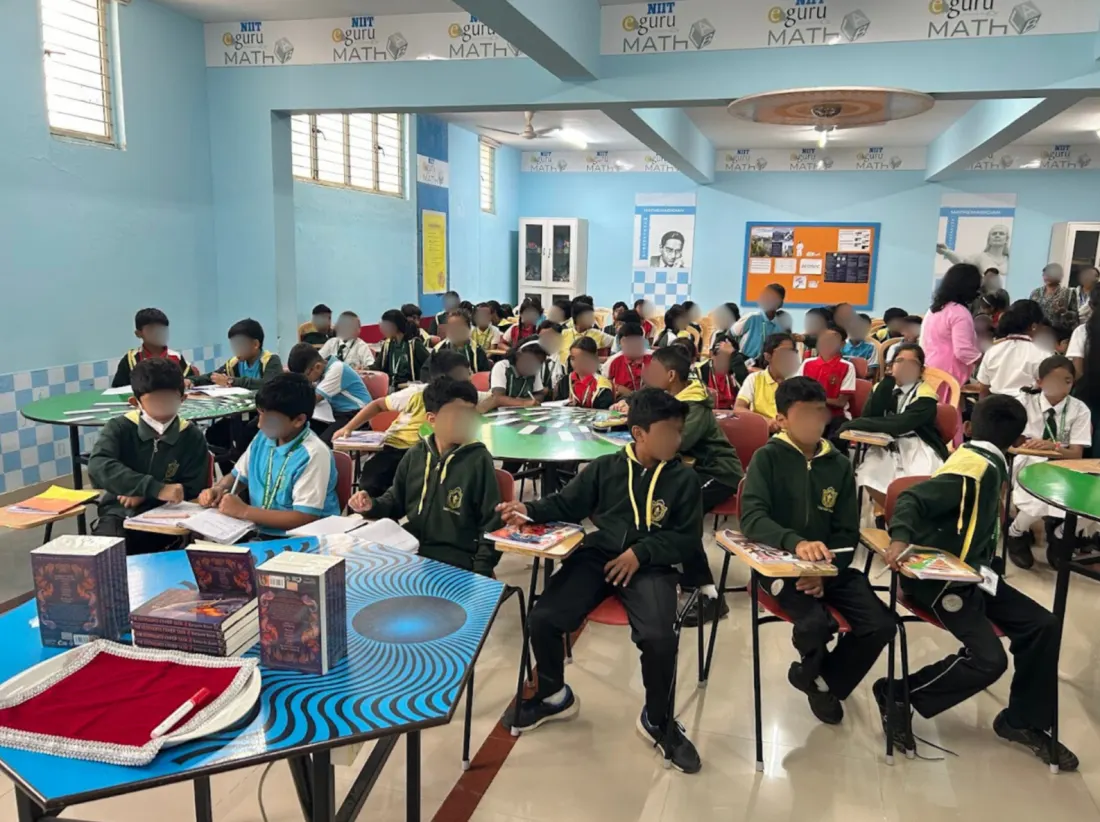 Author talk on stage at Harvest International School