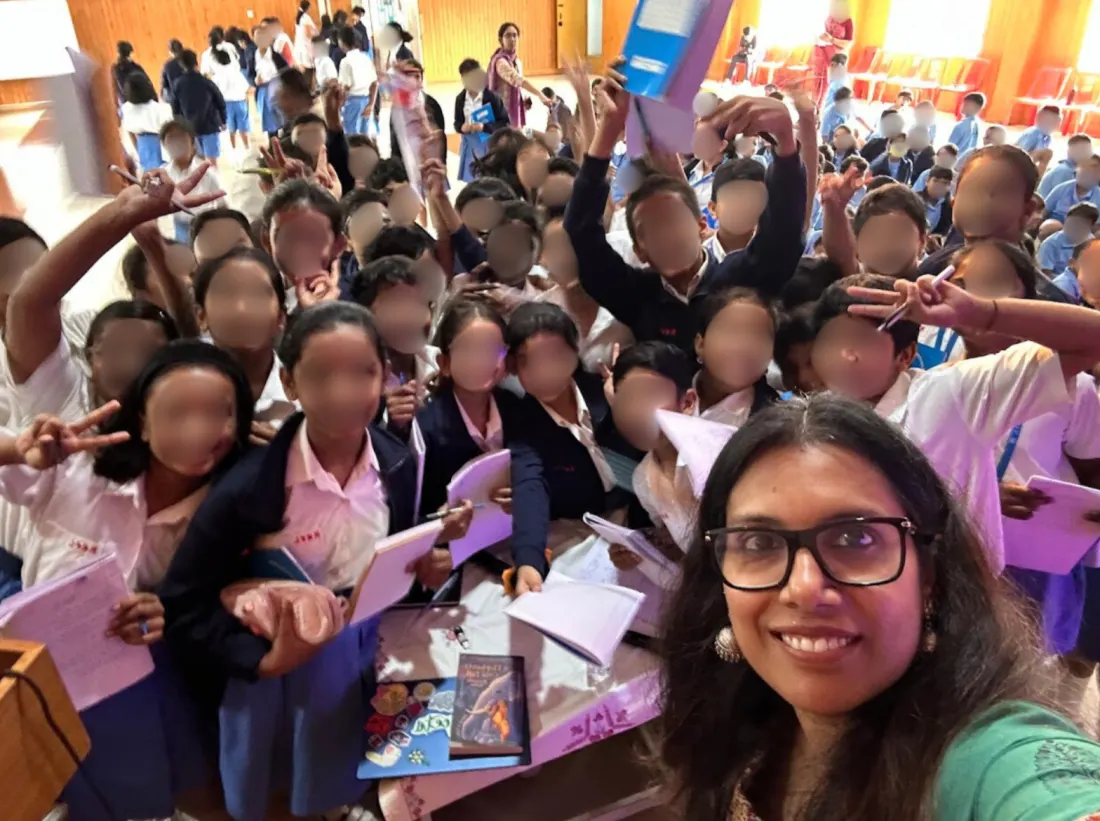 A group selfie with students after a workshop